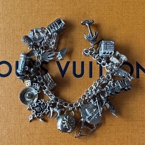 Vintage 50’s -‎ 60’s charm bracelet with 23 sterling silver charms